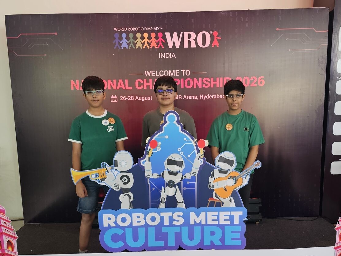 Three TheWorkshop students at the World Robot Olympiad India National Championship 2026 in Hyderabad, where a TheWorkshop team ranked 11th nationally out of 400+ teams.